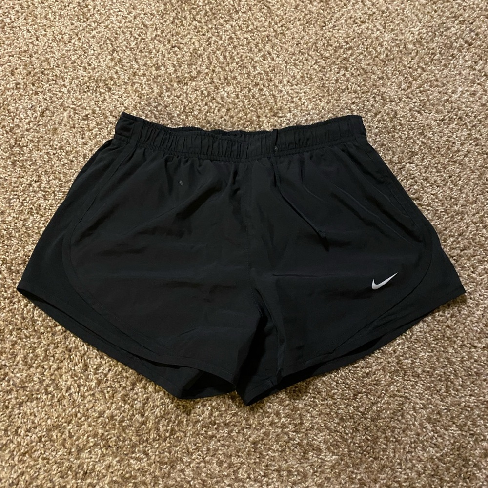 All black Nike running shorts. Size S